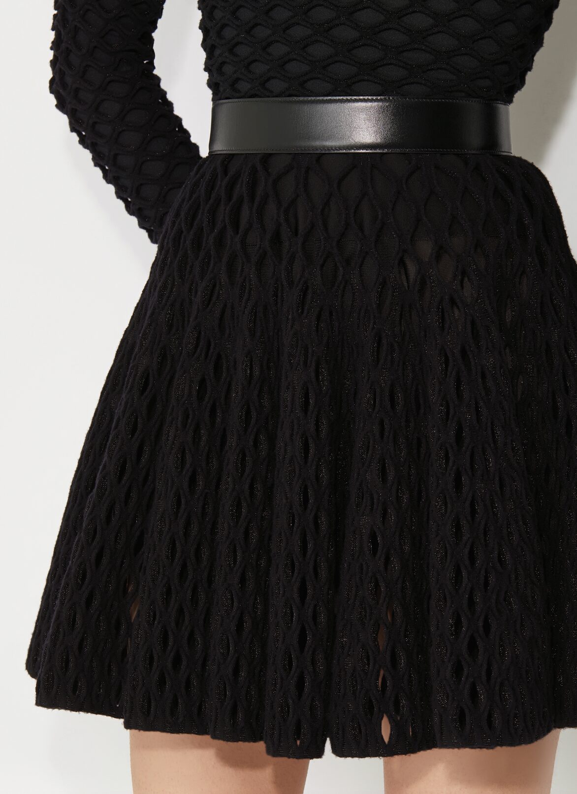 Cage knit skater skirt ALAÏA BLACK CAGE KNIT SKATER SKIRT